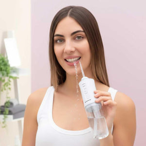 Irrigador bucal AquaDent