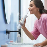 Irrigador bucal AquaDent